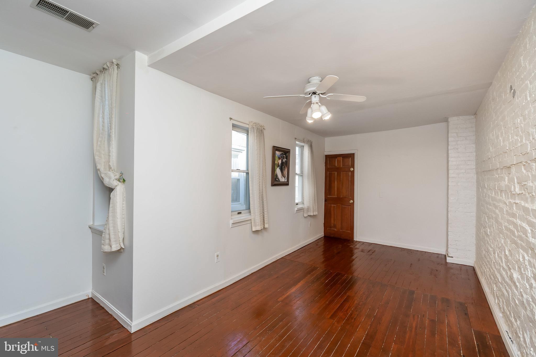 1047 Riverside Avenue Baltimore, MD 21230 - Photo 24 of 30 Ceiling fan and wood floors.