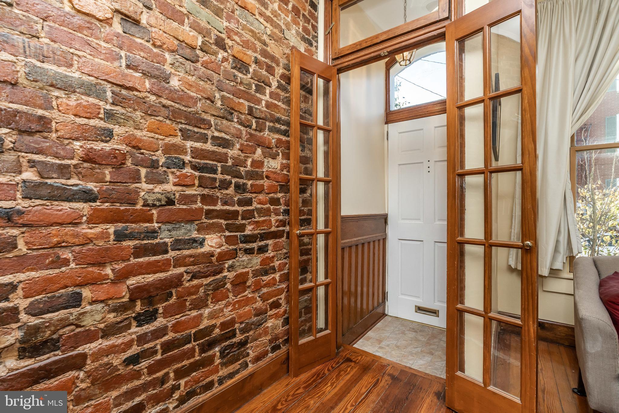 French doors from entry foyer into living room.