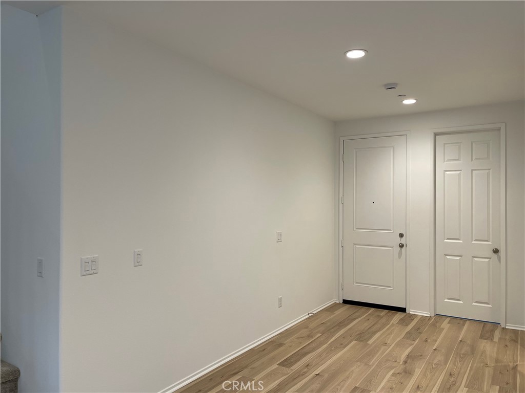 349 Lilly Street Rialto, CA 92376 - Photo 16 of 25 wooden floor in an empty room