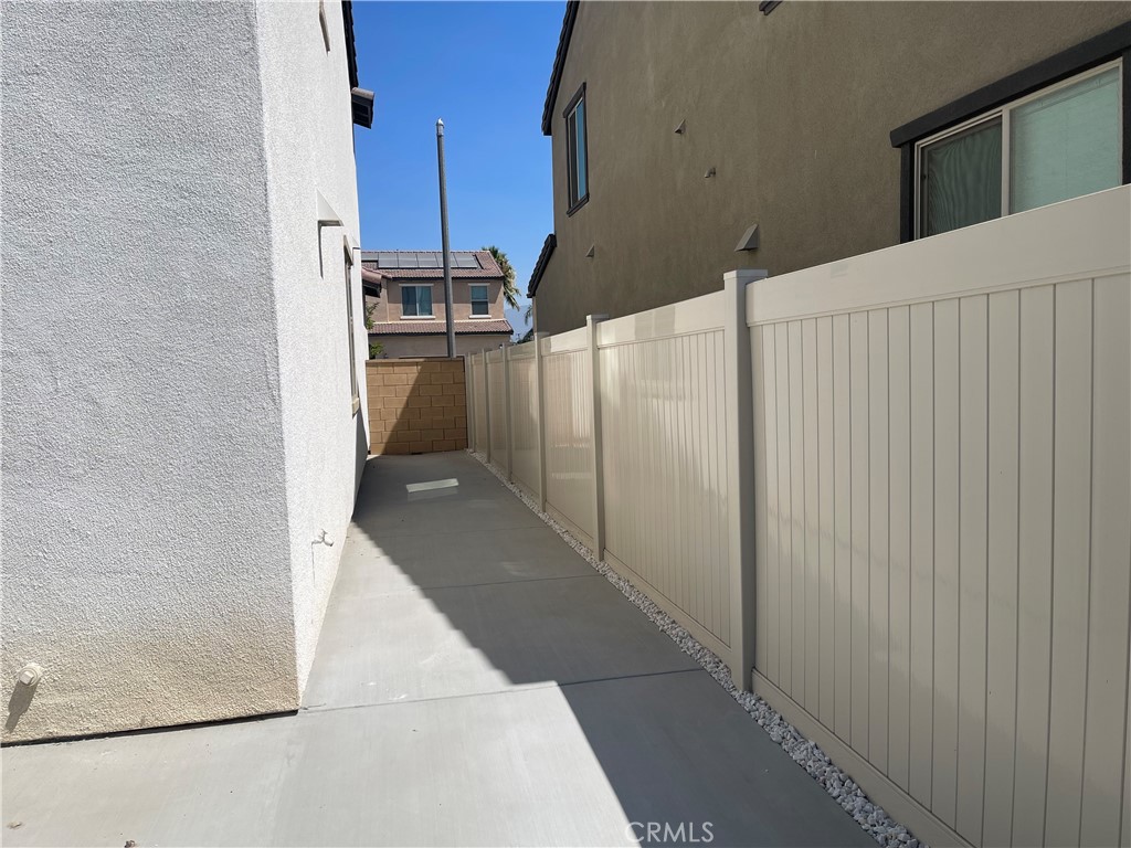 349 Lilly Street Rialto, CA 92376 - Photo 21 of 25 a view of a utility room with stairs