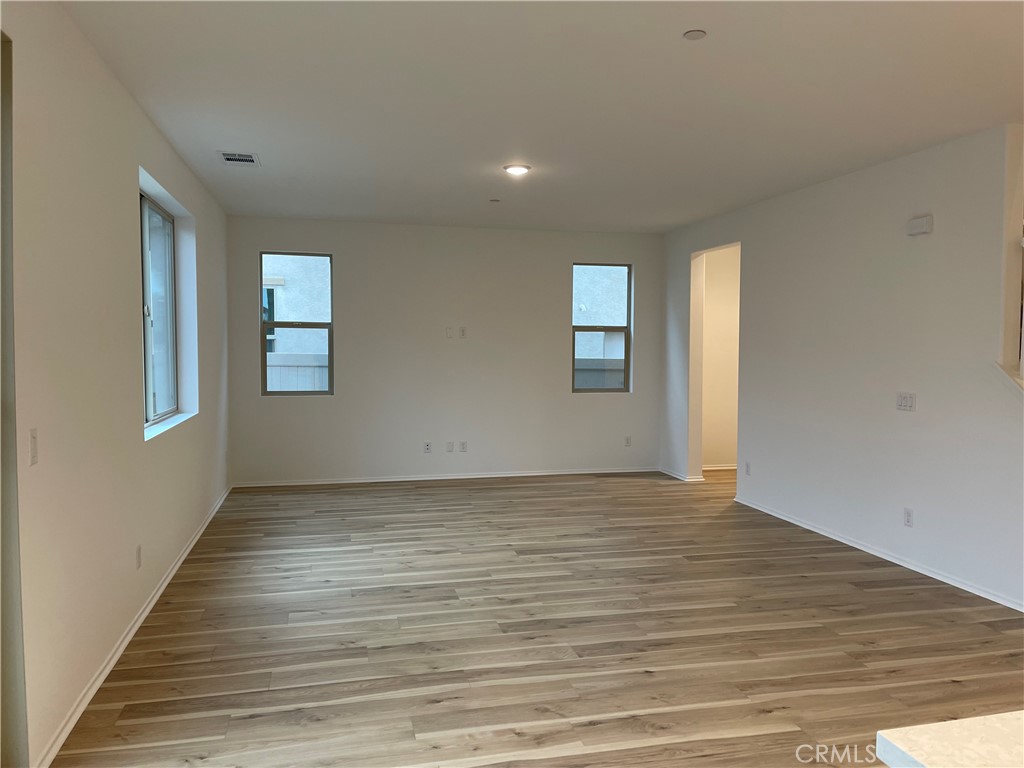 349 Lilly Street Rialto, CA 92376 - Photo 6 of 25 a view of an empty room and window