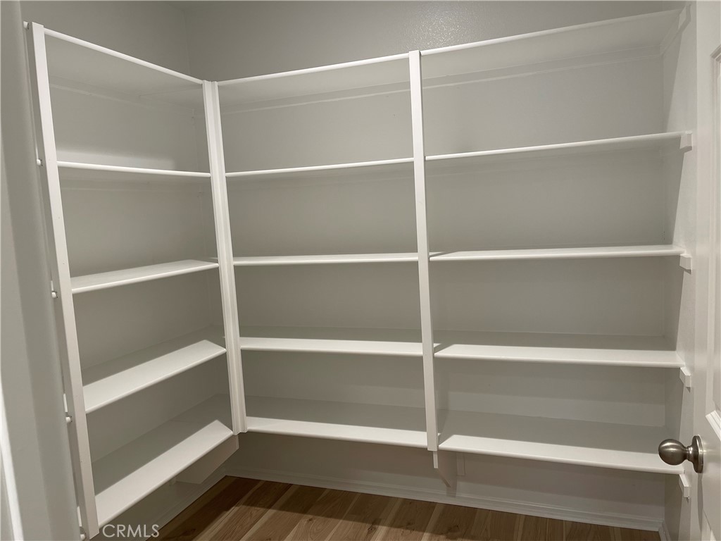 349 Lilly Street Rialto, CA 92376 - Photo 10 of 25 a view of walk in closet with empty racks