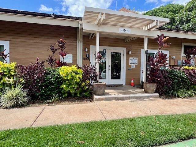 140 Uwapo Road, Unit 21101 Kihei, HI 96753 - Photo 11 of 12 a front view of a house with garden