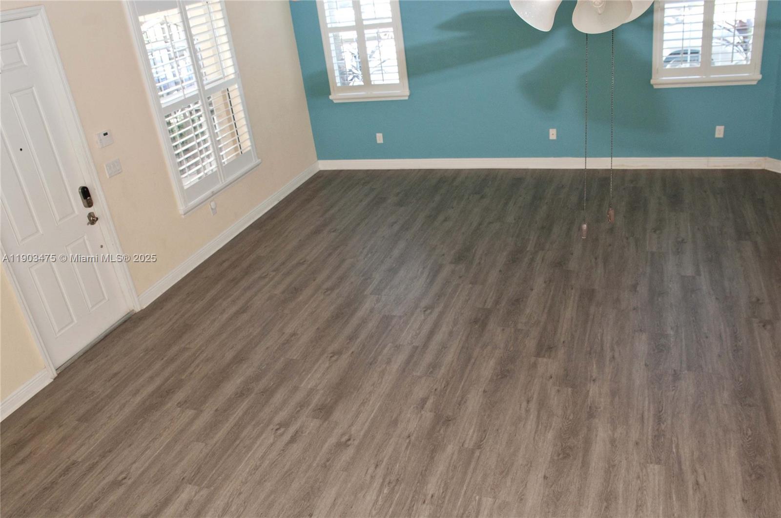 14620 Southwest 15th Street Pembroke Pines, FL 33027 - Photo 26 of 59 a view of room with window and wooden floor