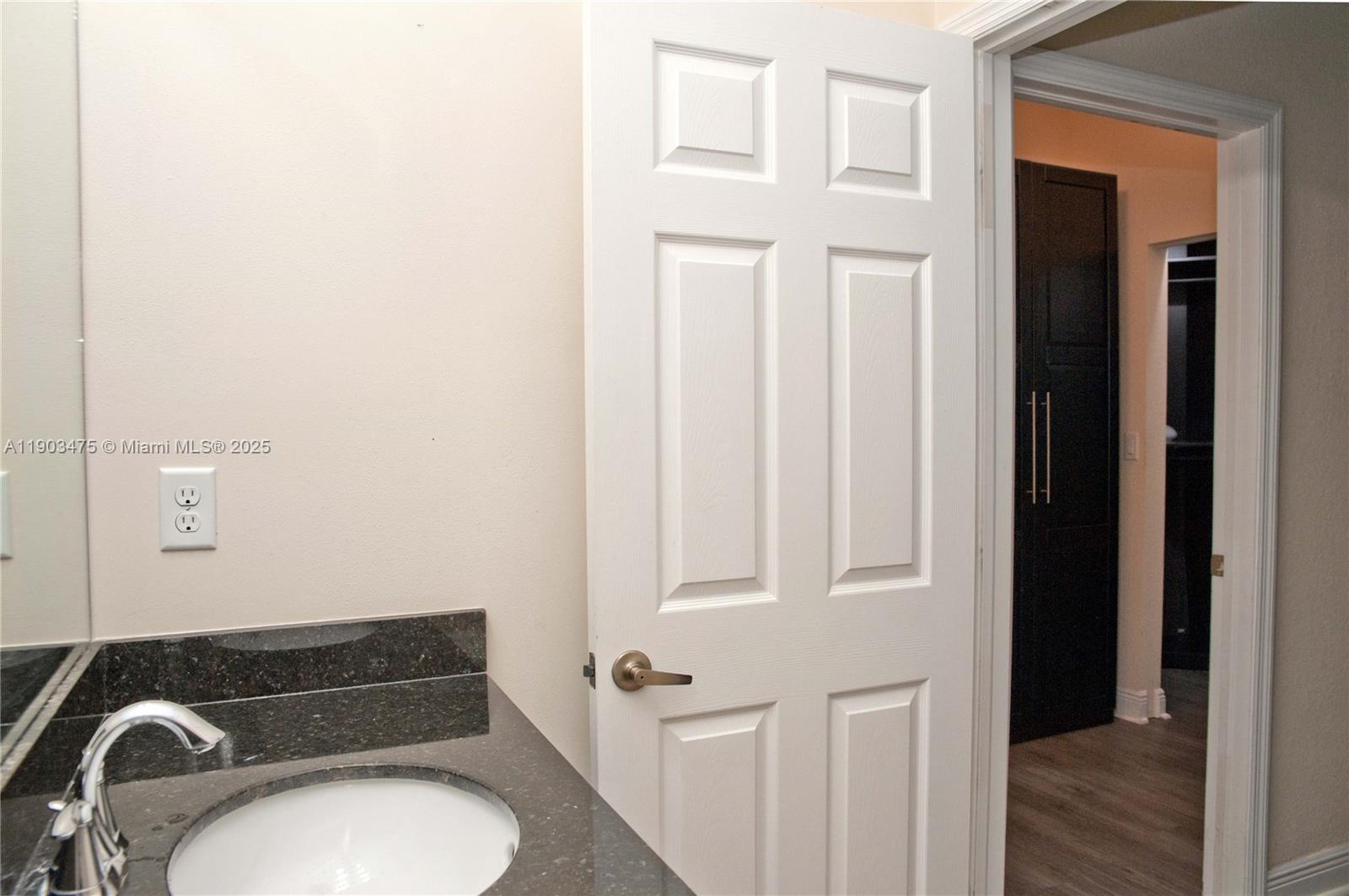 14620 Southwest 15th Street Pembroke Pines, FL 33027 - Photo 36 of 59 a bathroom with a toilet