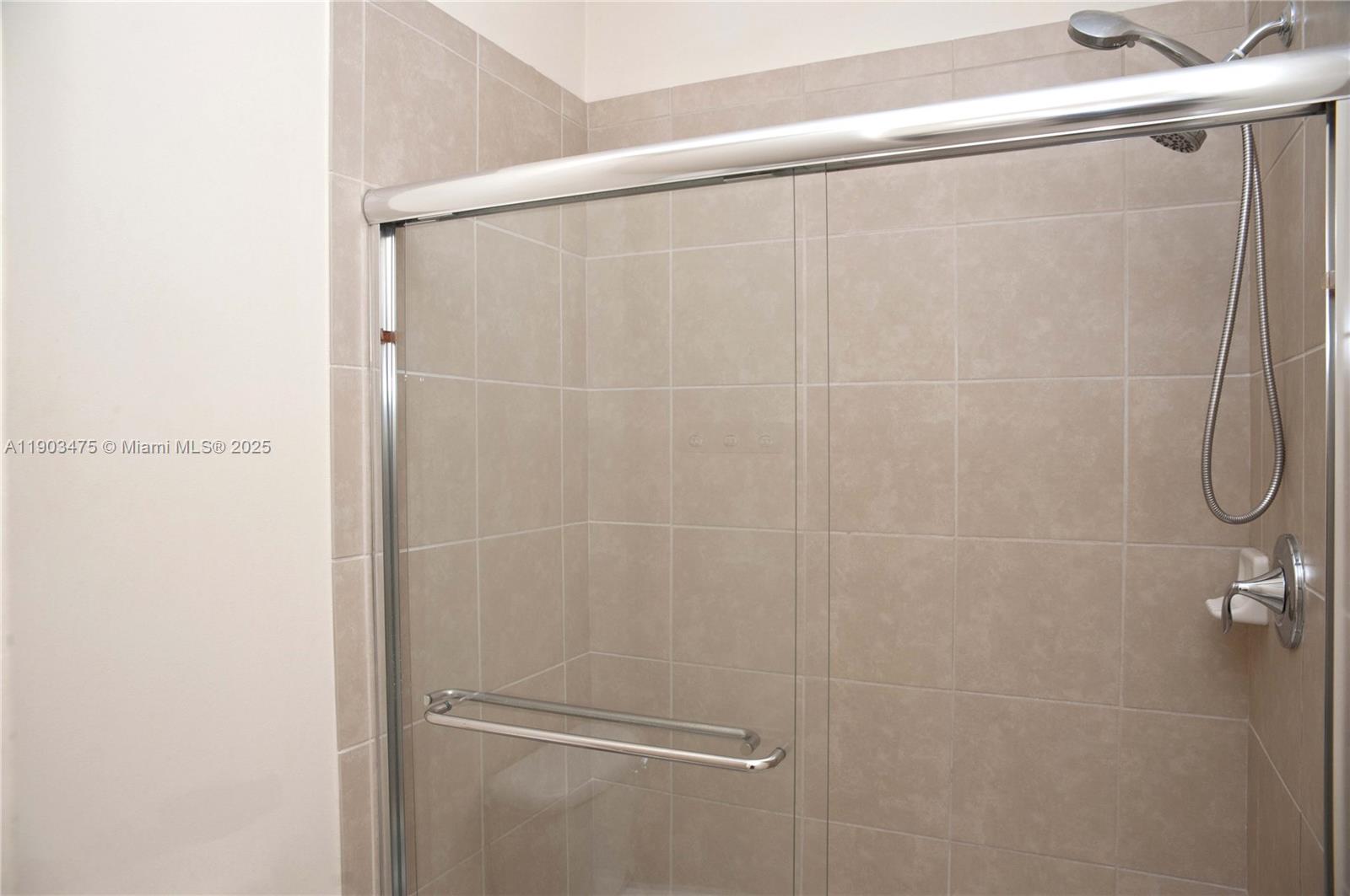 14620 Southwest 15th Street Pembroke Pines, FL 33027 - Photo 41 of 59 a bathroom with a shower