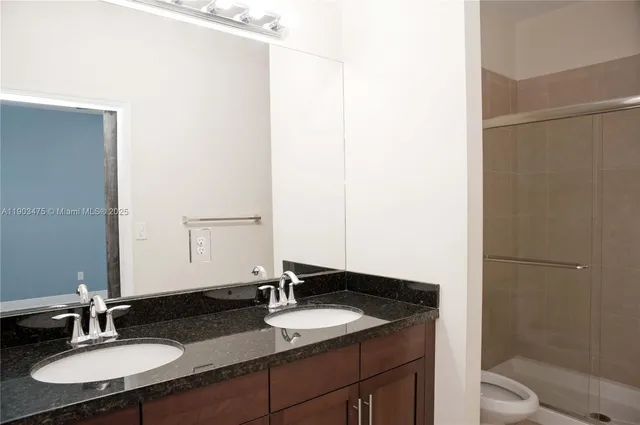 a view of a house with a door and wooden door