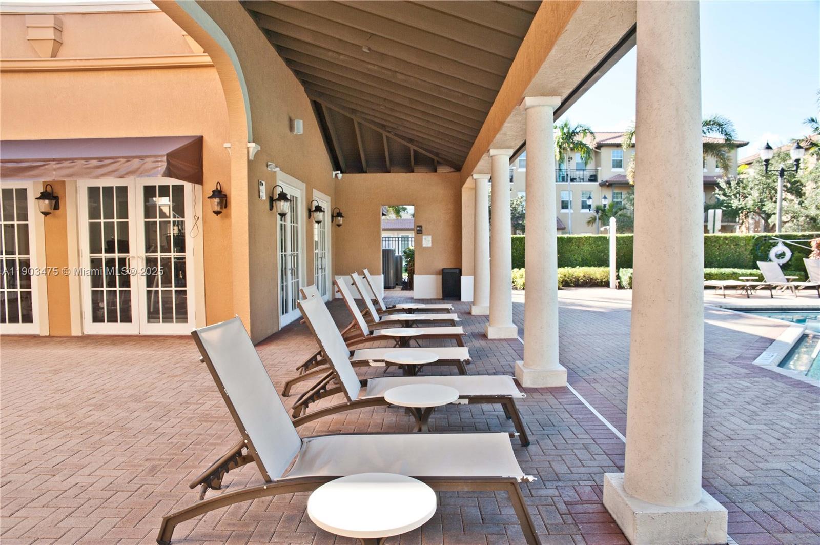 14620 Southwest 15th Street Pembroke Pines, FL 33027 - Photo 58 of 59 a view of a balcony with chairs and wooden floor