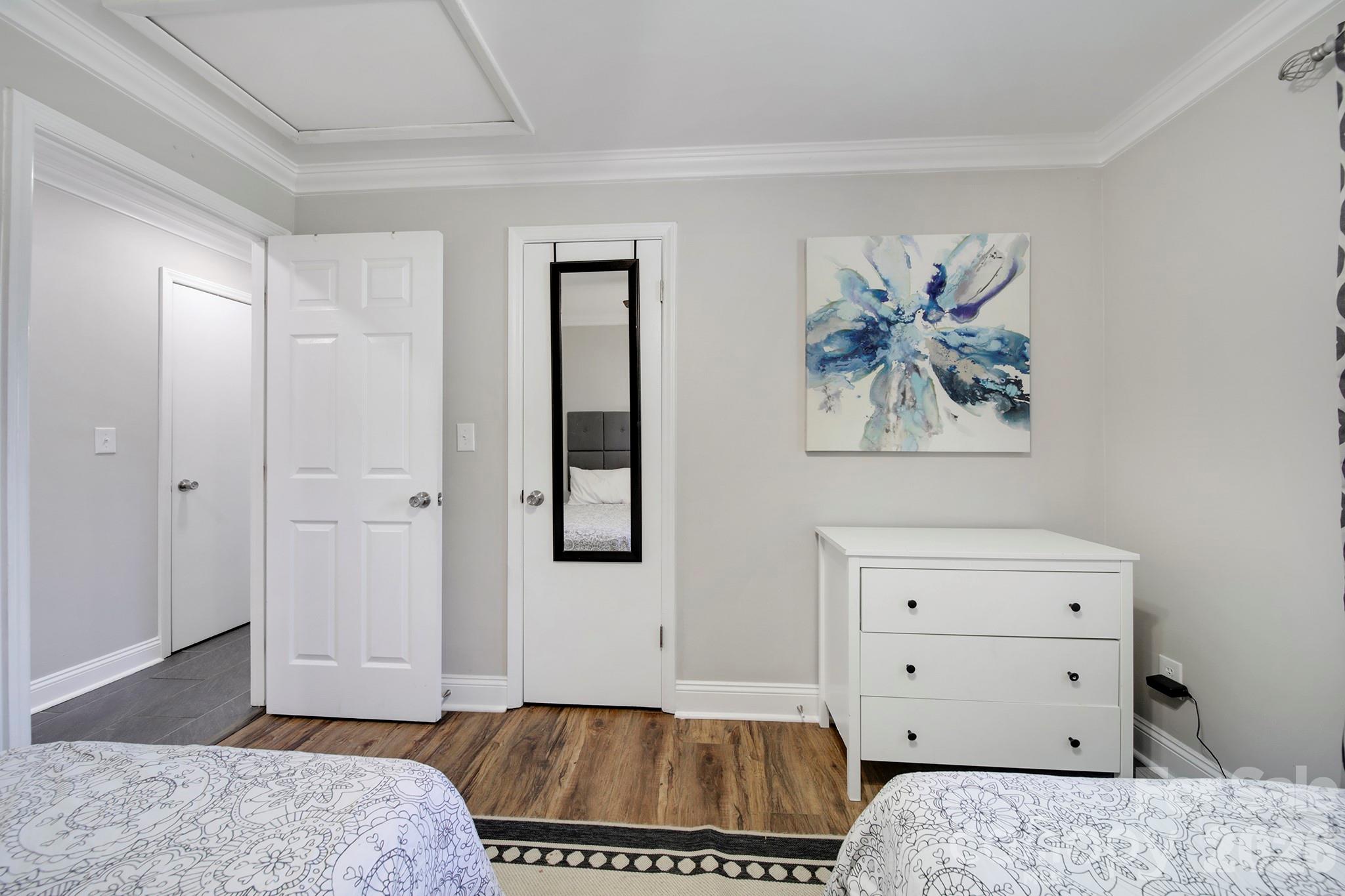 100 Privette Street Fort Mill, SC 29715 - Photo 12 of 25 a bedroom with a bed and a dresser