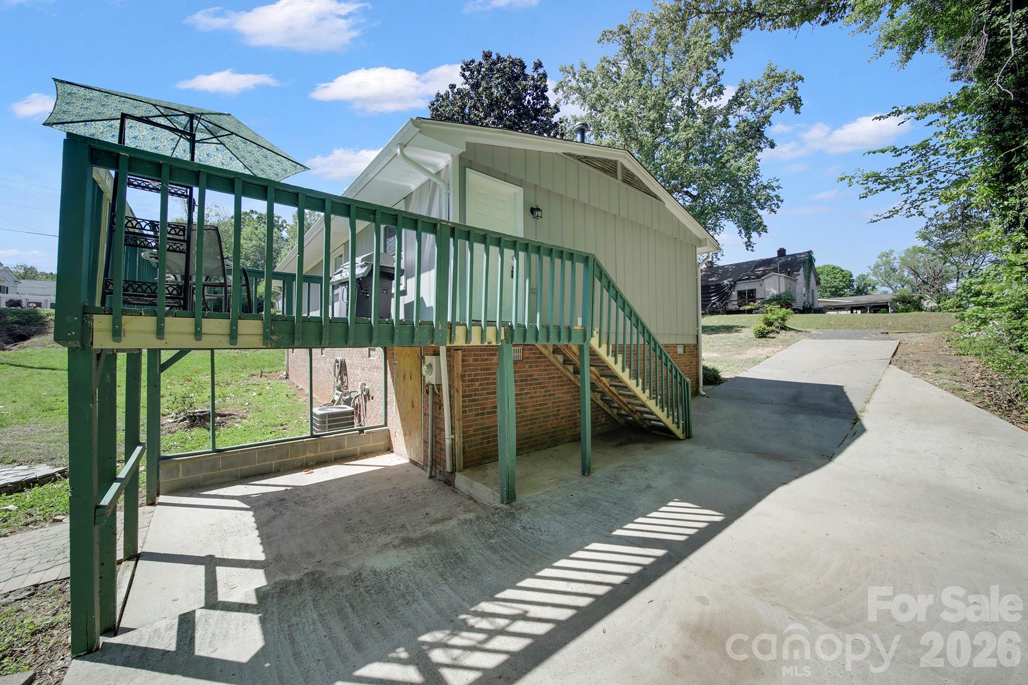 100 Privette Street Fort Mill, SC 29715 - Photo 20 of 25 a view of a porch with a yard