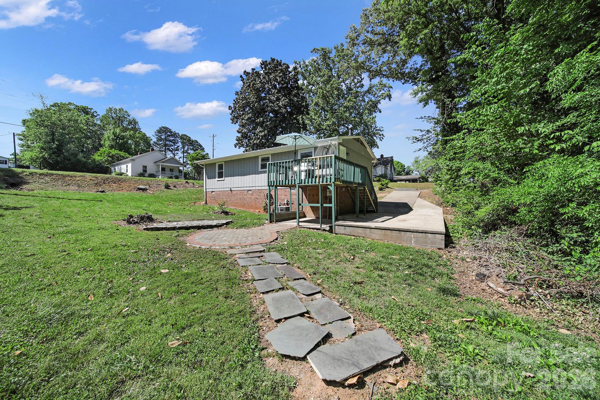 100 Privette Street Fort Mill, SC 29715 - Photo 21 of 25 a view of a house with a yard