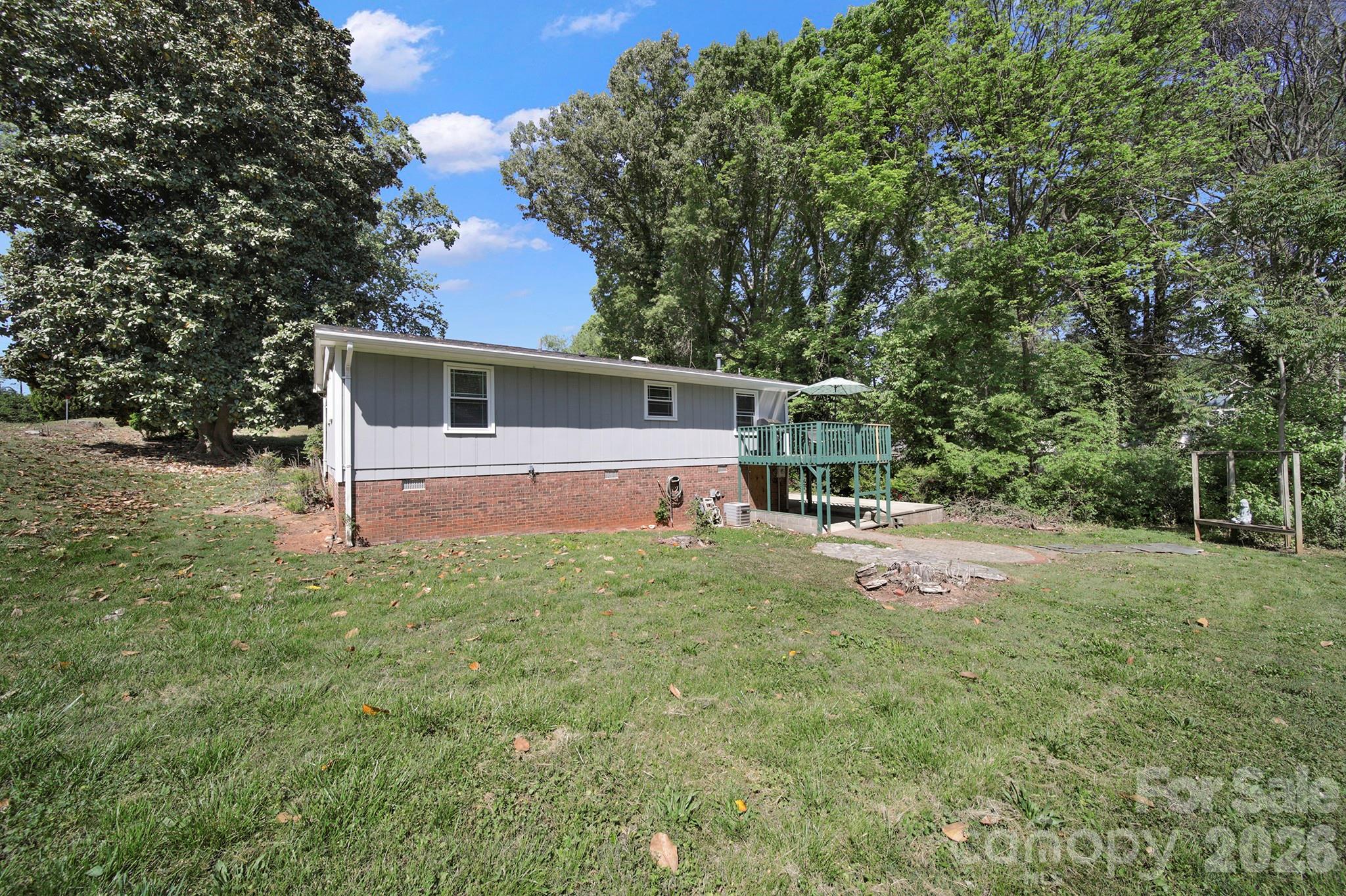100 Privette Street Fort Mill, SC 29715 - Photo 22 of 25 a house with trees in front of it