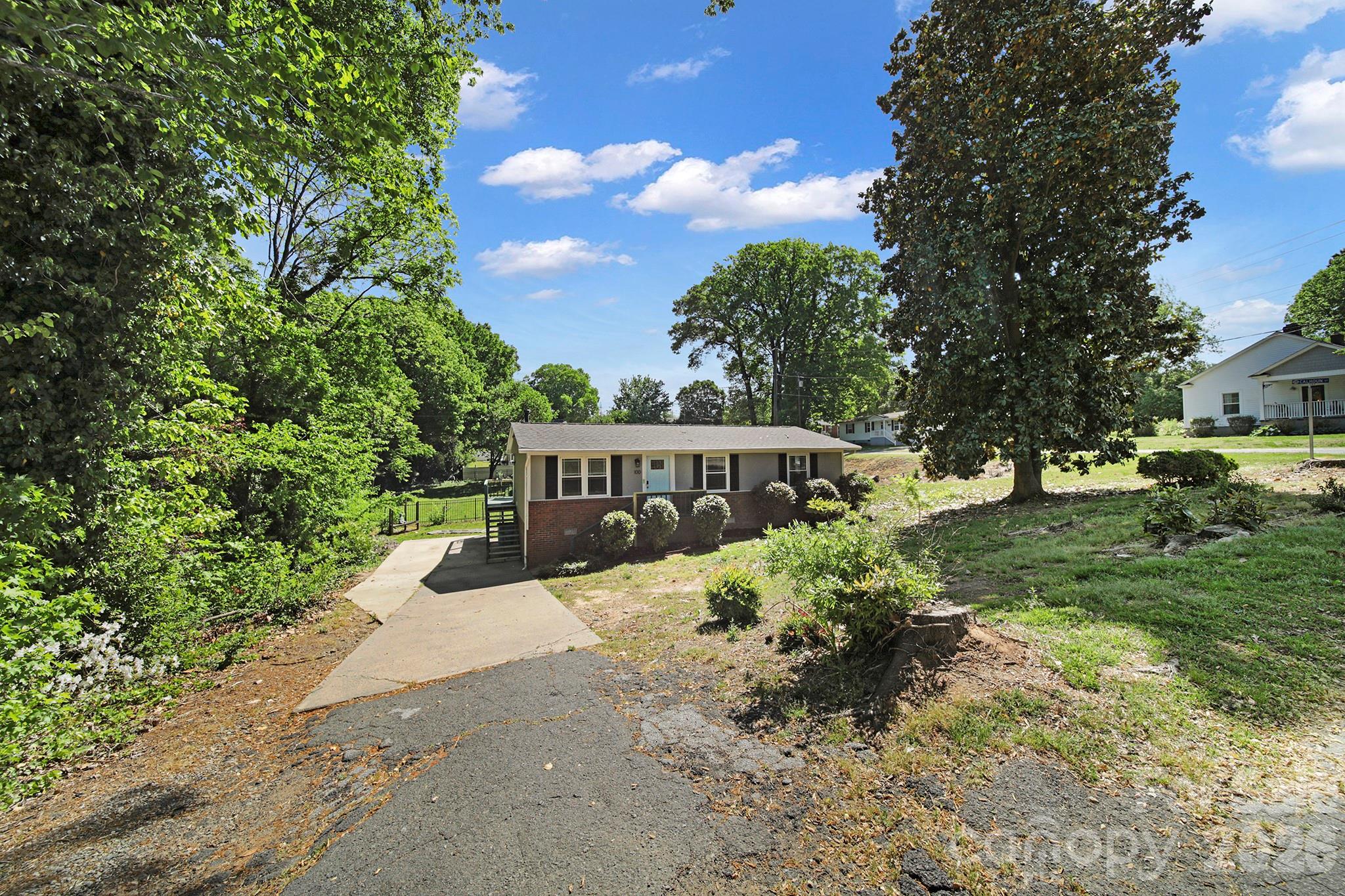 100 Privette Street Fort Mill, SC 29715 - Photo 24 of 25 a view of a house with a garden