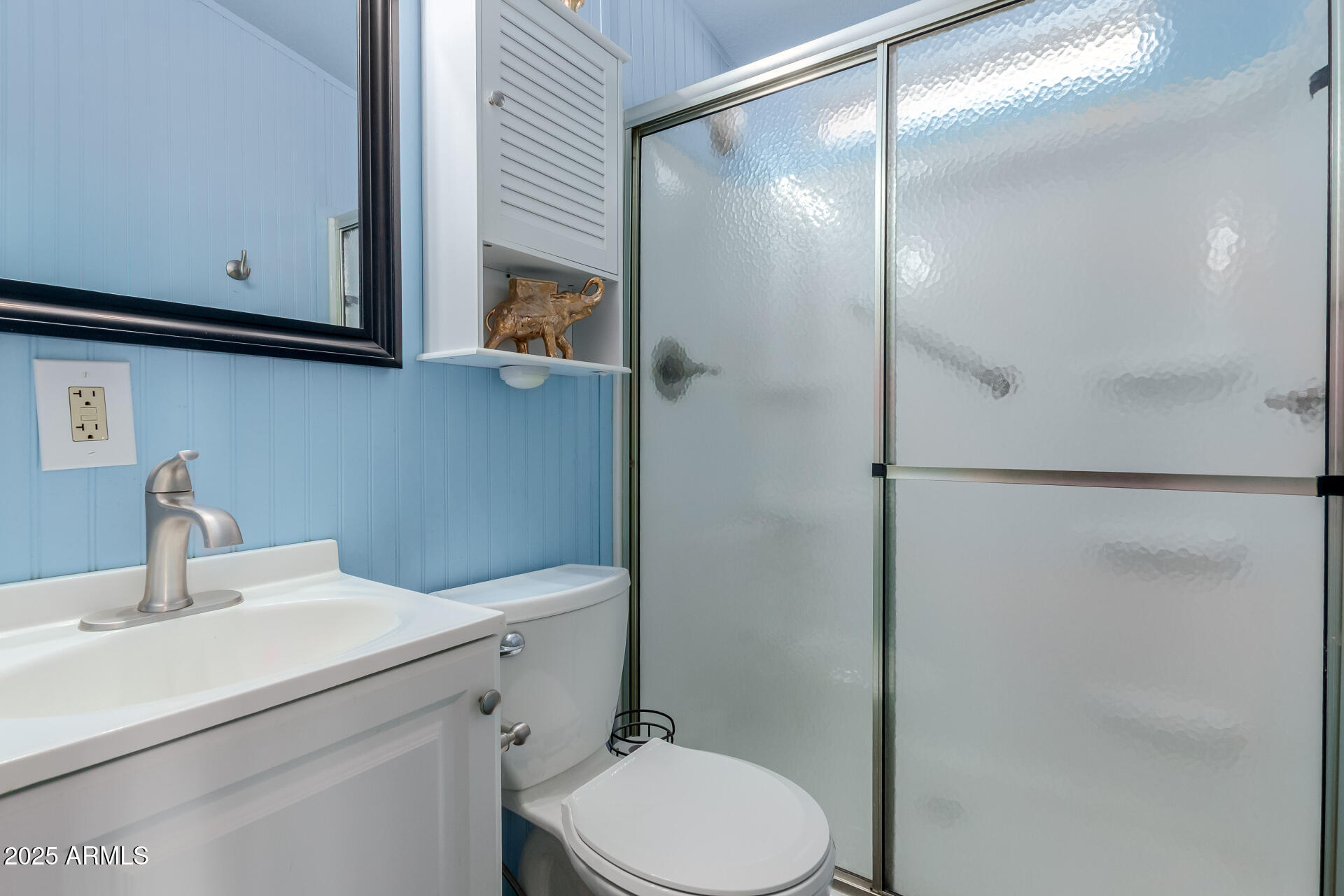 17200 West Bell Road, Unit 1233 Surprise, AZ 85374 - Photo 18 of 41 a bathroom with a sink a toilet and shower
