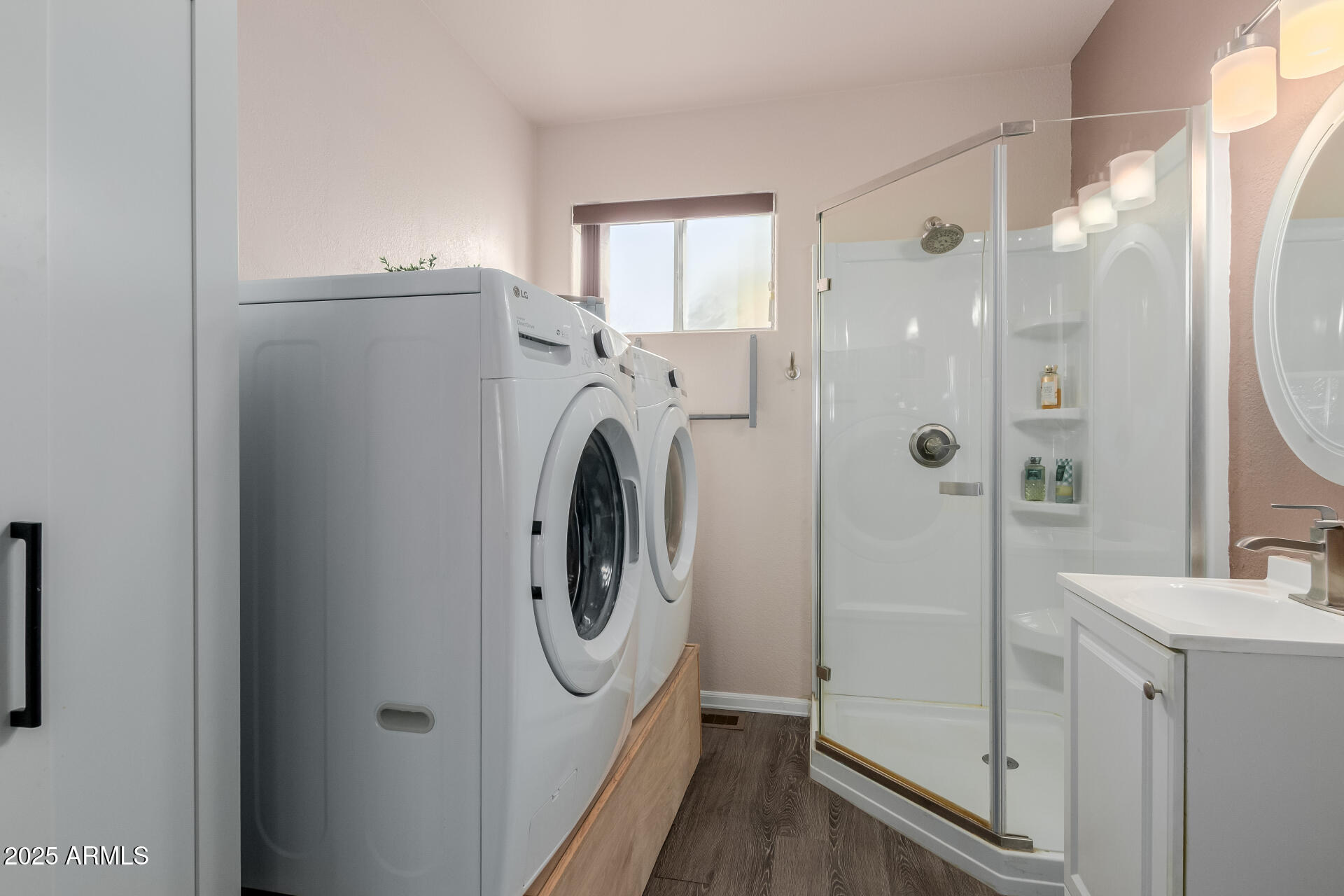 17200 West Bell Road, Unit 1233 Surprise, AZ 85374 - Photo 21 of 41 a view of a bathroom with a washer and dryer