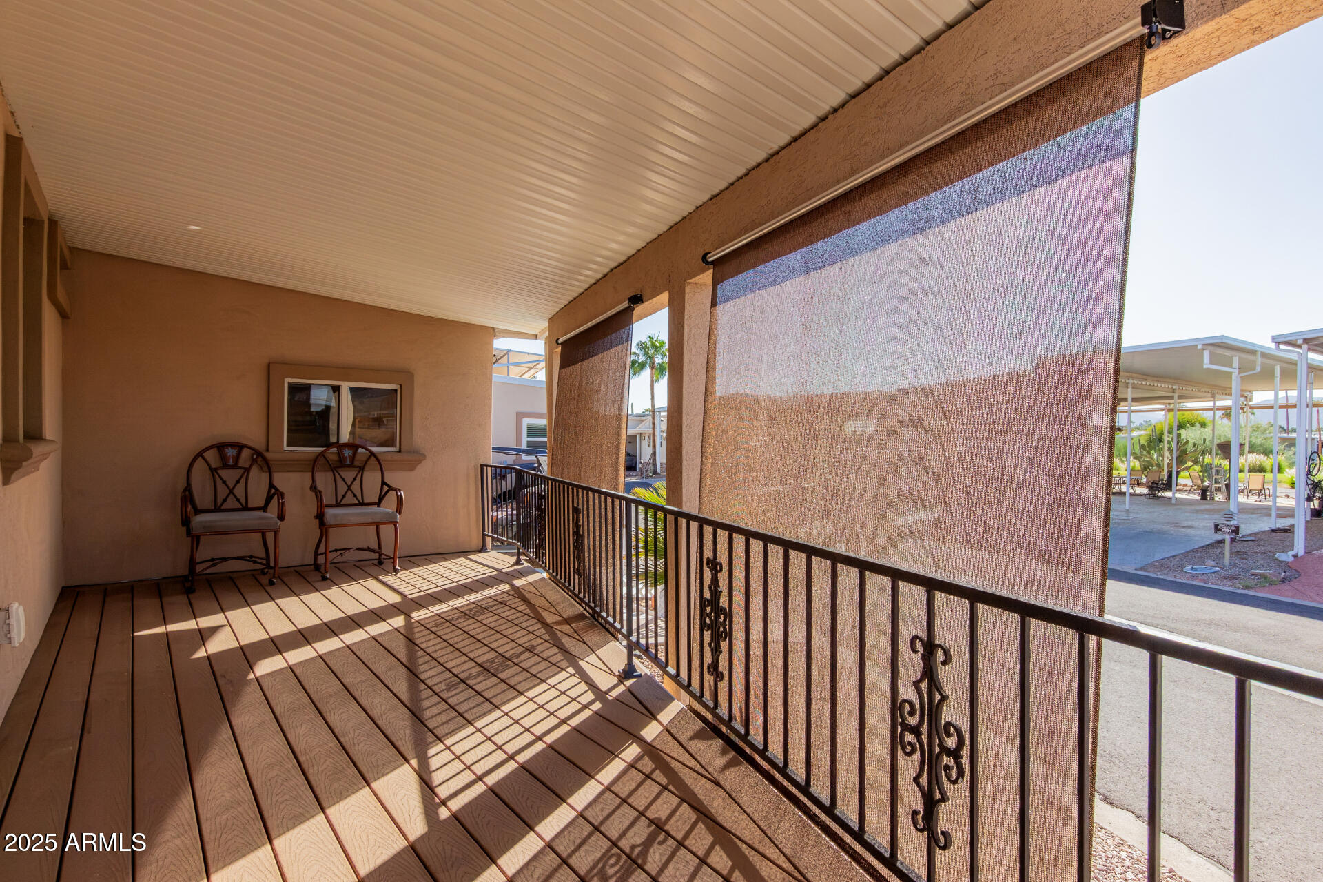 17200 West Bell Road, Unit 1233 Surprise, AZ 85374 - Photo 23 of 41 a balcony with table and chairs