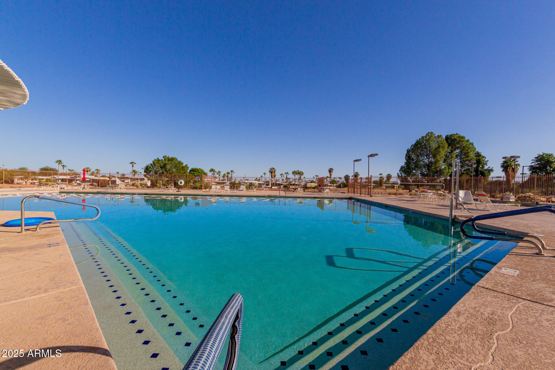 17200 West Bell Road, Unit 1233 Surprise, AZ 85374 - Photo 28 of 41 a view of a balcony with chairs