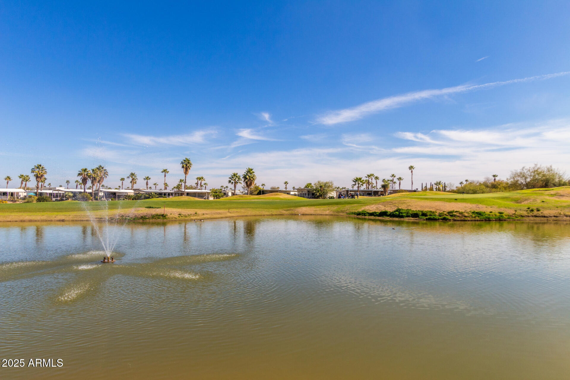 17200 West Bell Road, Unit 1233 Surprise, AZ 85374 - Photo 32 of 41 a view of a lake with houses