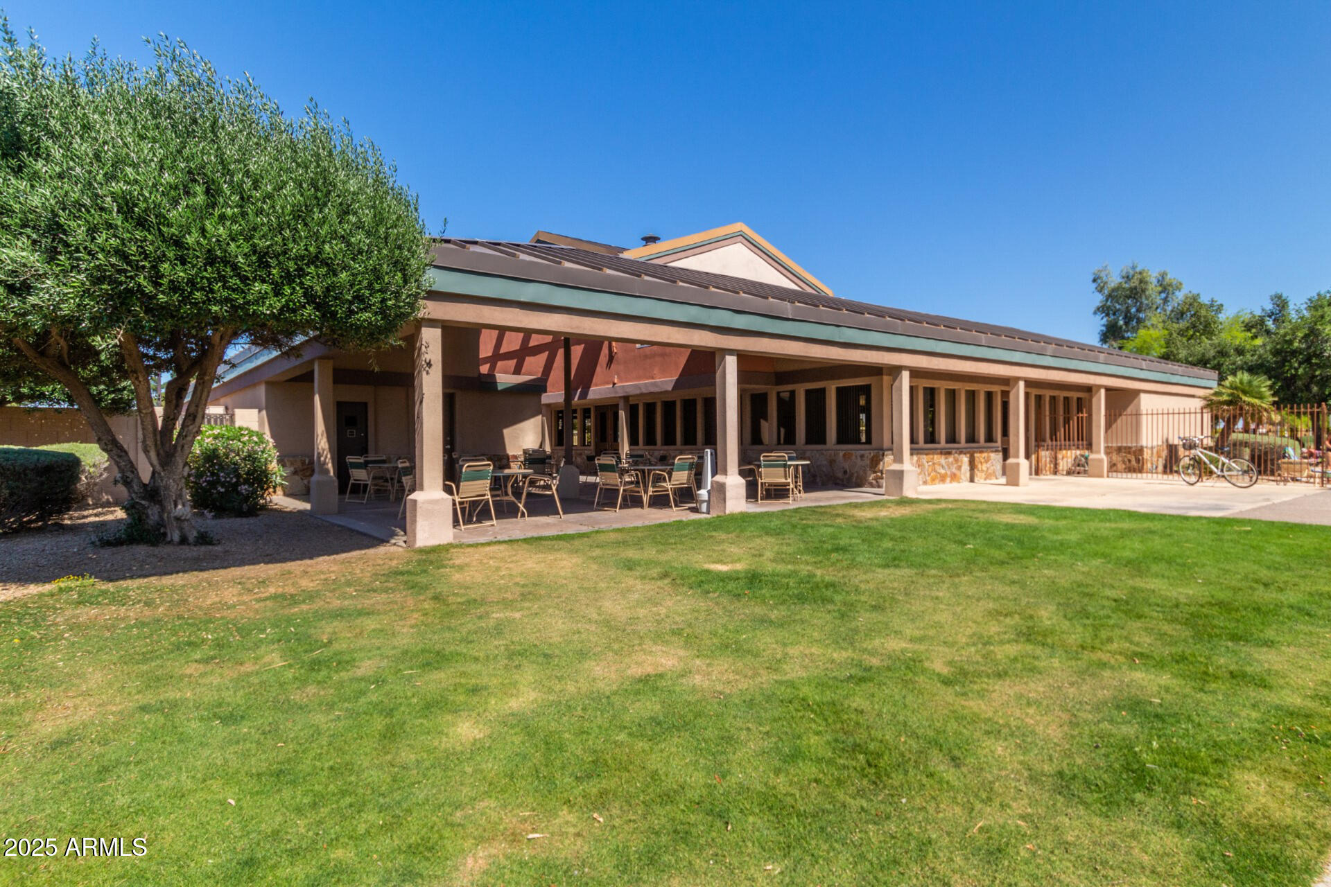 17200 West Bell Road, Unit 1233 Surprise, AZ 85374 - Photo 38 of 41 a view of a house with a yard patio and a patio