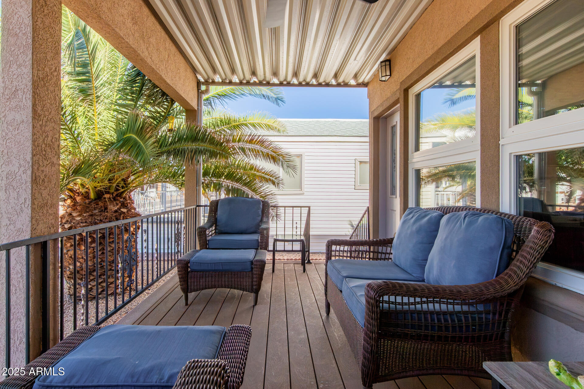 17200 West Bell Road, Unit 1233 Surprise, AZ 85374 - Photo 5 of 41 a living room with furniture and a large window