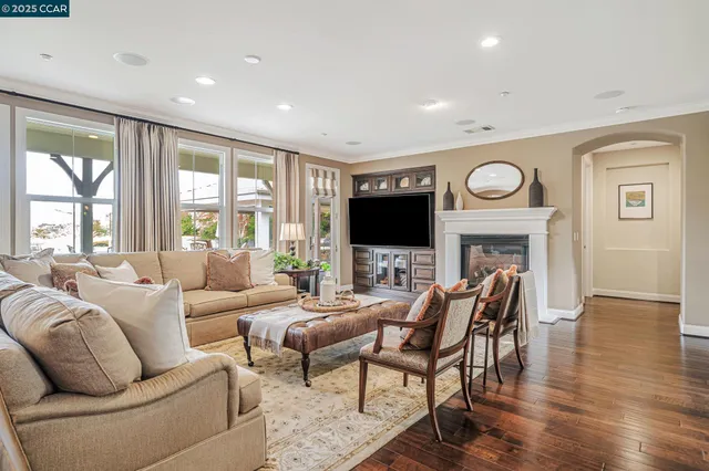 a kitchen with stainless steel appliances kitchen island granite countertop a sink and cabinets