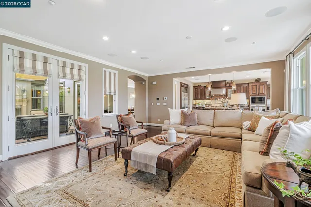 a kitchen with stainless steel appliances granite countertop a stove and a sink