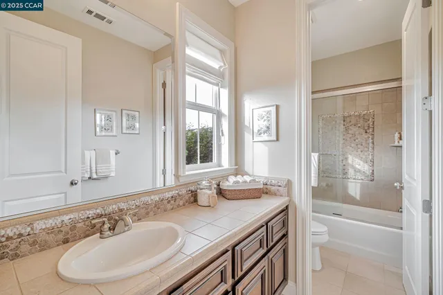 a view of entryway with wooden floor and a potted plant