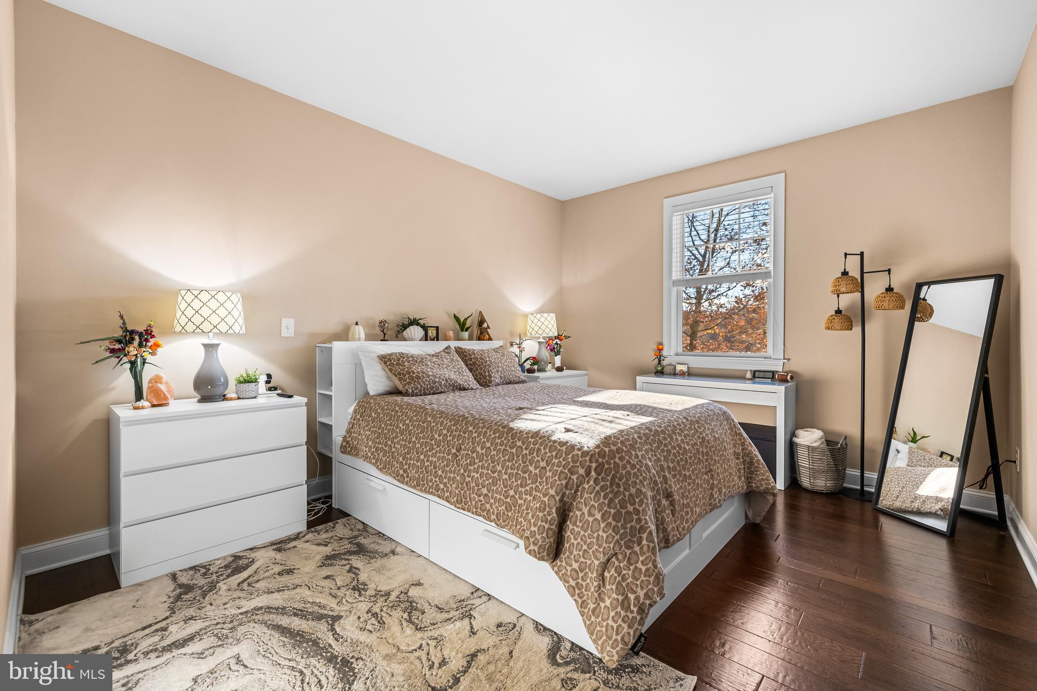 20834 Old York Road Parkton, MD 21120 - Photo 21 of 35 a bedroom with a bed and a large mirror on the dresser