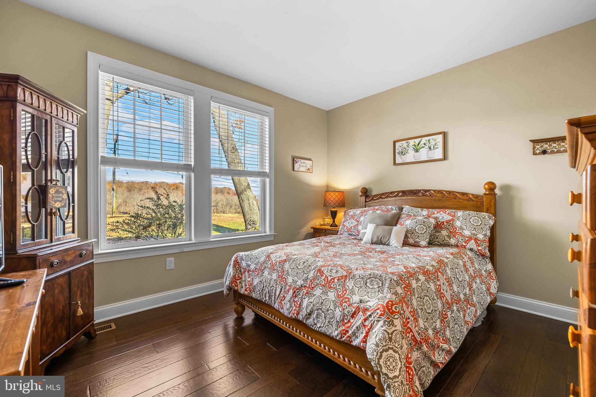 20834 Old York Road Parkton, MD 21120 - Photo 28 of 35 a bedroom with a bed and wooden floor