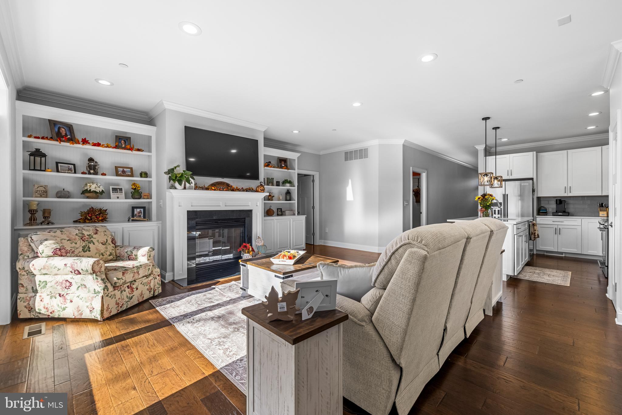 20834 Old York Road Parkton, MD 21120 - Photo 10 of 35 a living room with furniture a flat screen tv and a fireplace