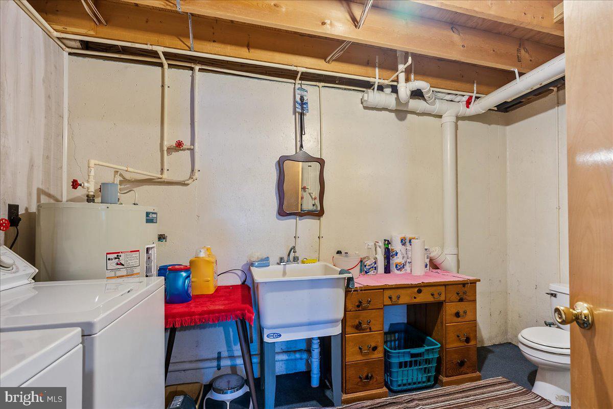 663 Bear Woods Road Mount Storm, WV 26739 - Photo 32 of 73 Functional laundry space with charm.