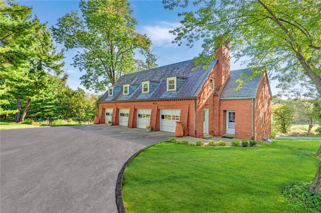 220-2 Scaife Road Sewickley, PA 15143 - Photo 44 of 49 a front view of house with yard and green space