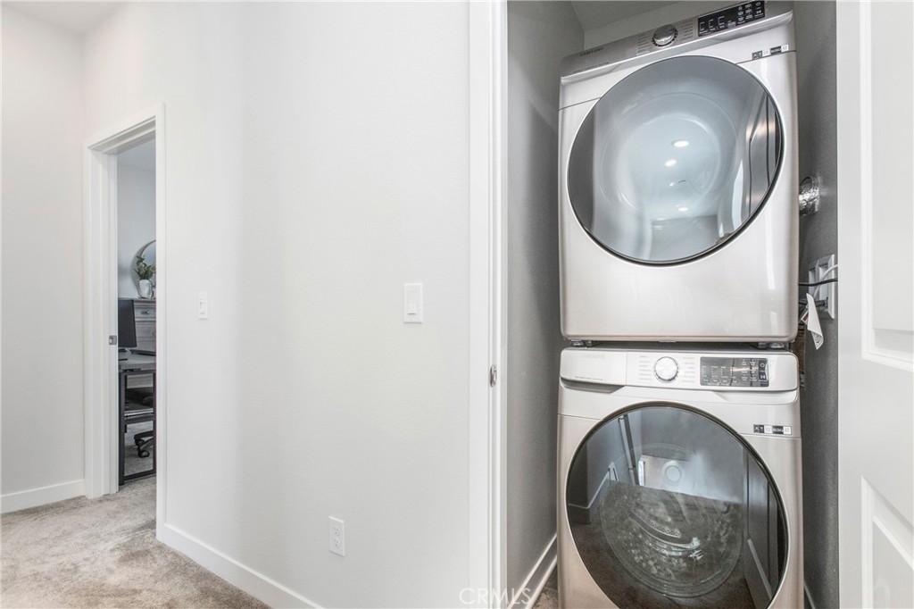 116 Stetson Street Rancho Mission Viejo, CA 92694 - Photo 12 of 45 a utility room with dryer and washer