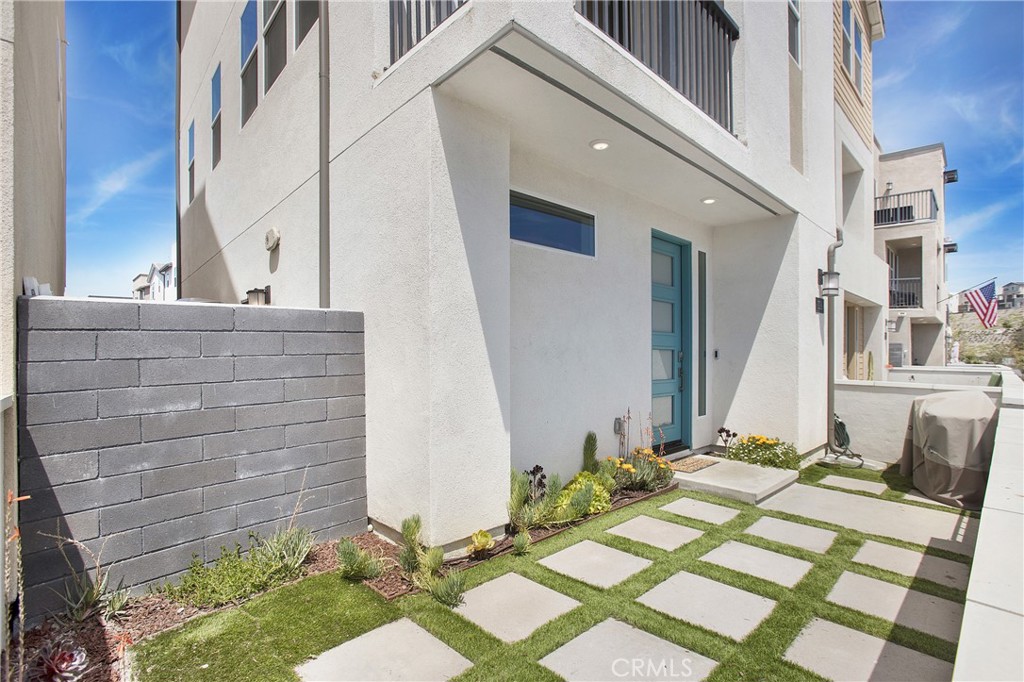 116 Stetson Street Rancho Mission Viejo, CA 92694 - Photo 13 of 45 a view of a house with backyard and wooden floor