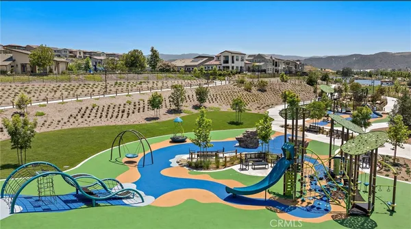 an aerial view of a swimming pool and outdoor space