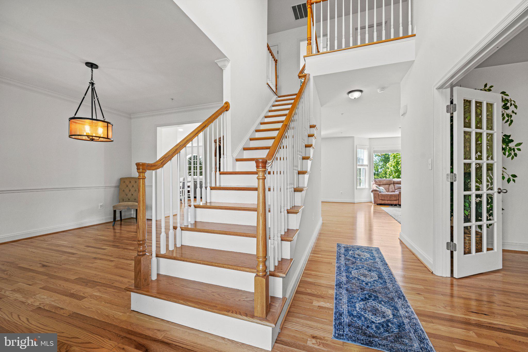 10693 Harding Road Laurel, MD 20723 - Photo 9 of 55 Inviting entryway with elegant staircase.