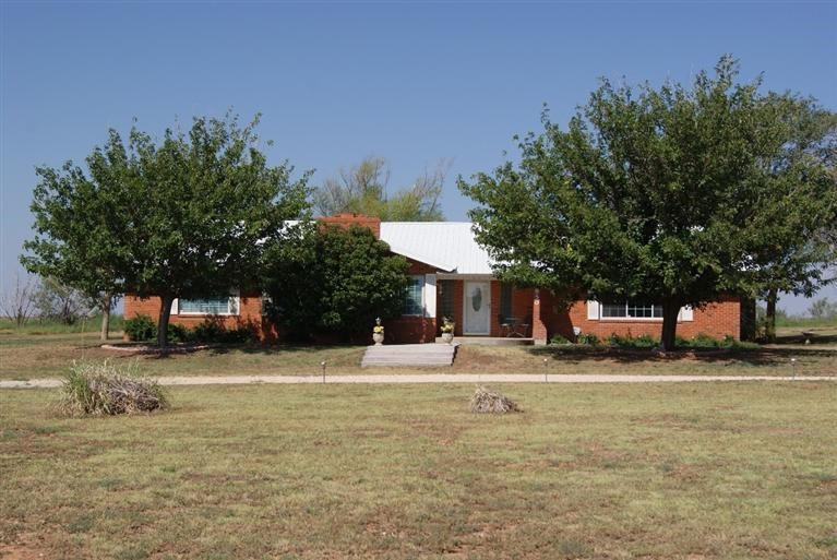 850 Nightingale Road Lubbock, TX 79407 - Photo 1 of 10 a view of a house with a yard