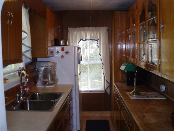 40 Meadowbrook Road Chelmsford, MA 01863 - Photo 7 of 15 a kitchen with a sink and cabinets