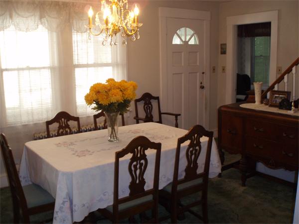 40 Meadowbrook Road Chelmsford, MA 01863 - Photo 10 of 15 a view of a dining room with furniture and chandelier