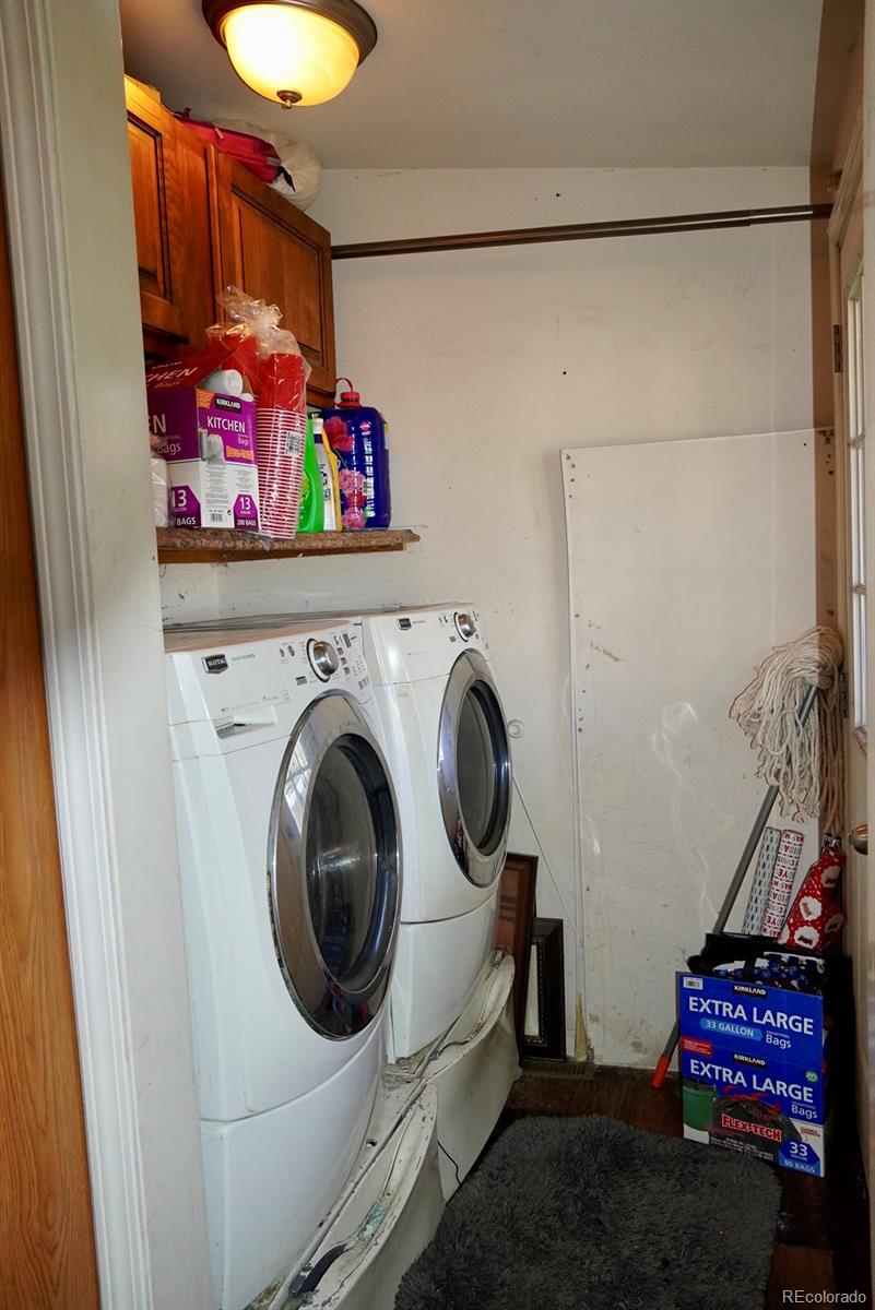 9100 Tejon Street Denver, CO 80260 - Photo 20 of 23 a utility room with dryer and washer