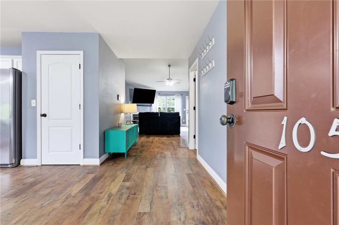 105 Lacy Lane Anderson, SC 29621 - Photo 2 of 16 Enter into a welcoming interior boasting rich wood flooring and an open-concept living area.