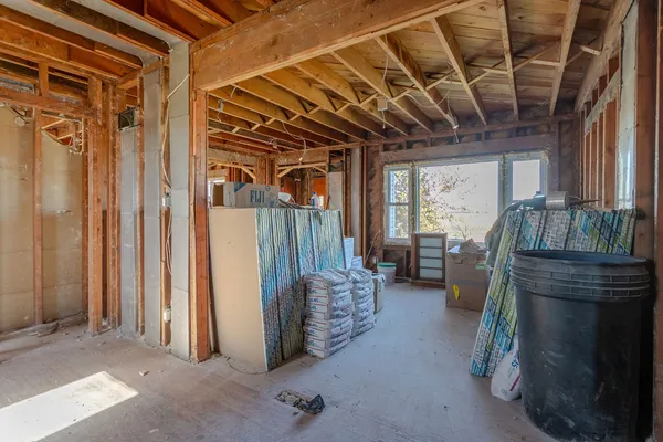 a view of a porch with wooden floor and stairs