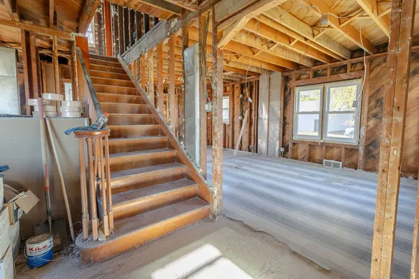 a view of a room with wooden walls