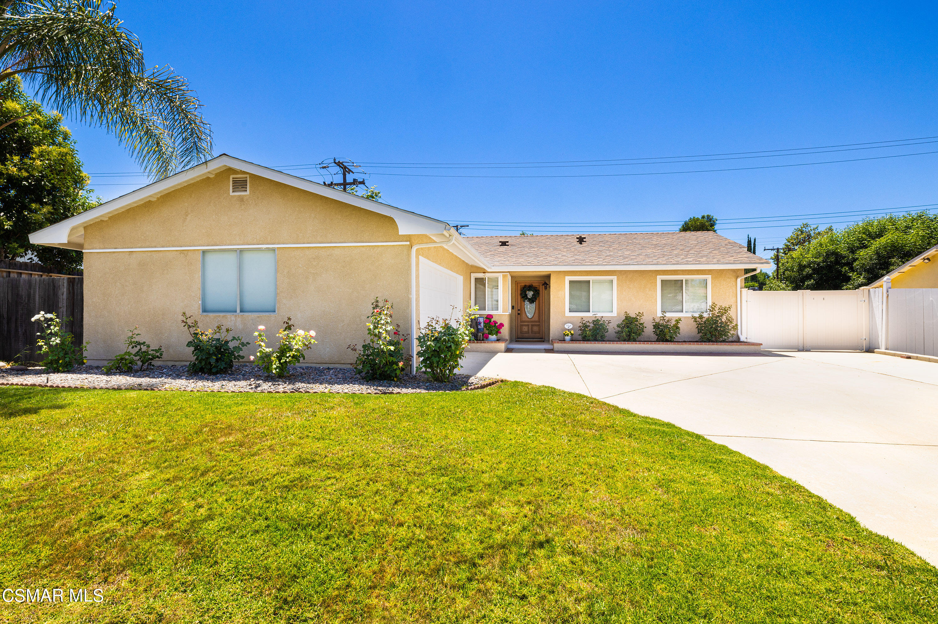 973 Appleton Road Simi Valley, CA 93065 - Photo 1 of 24 a front view of a house with a yard