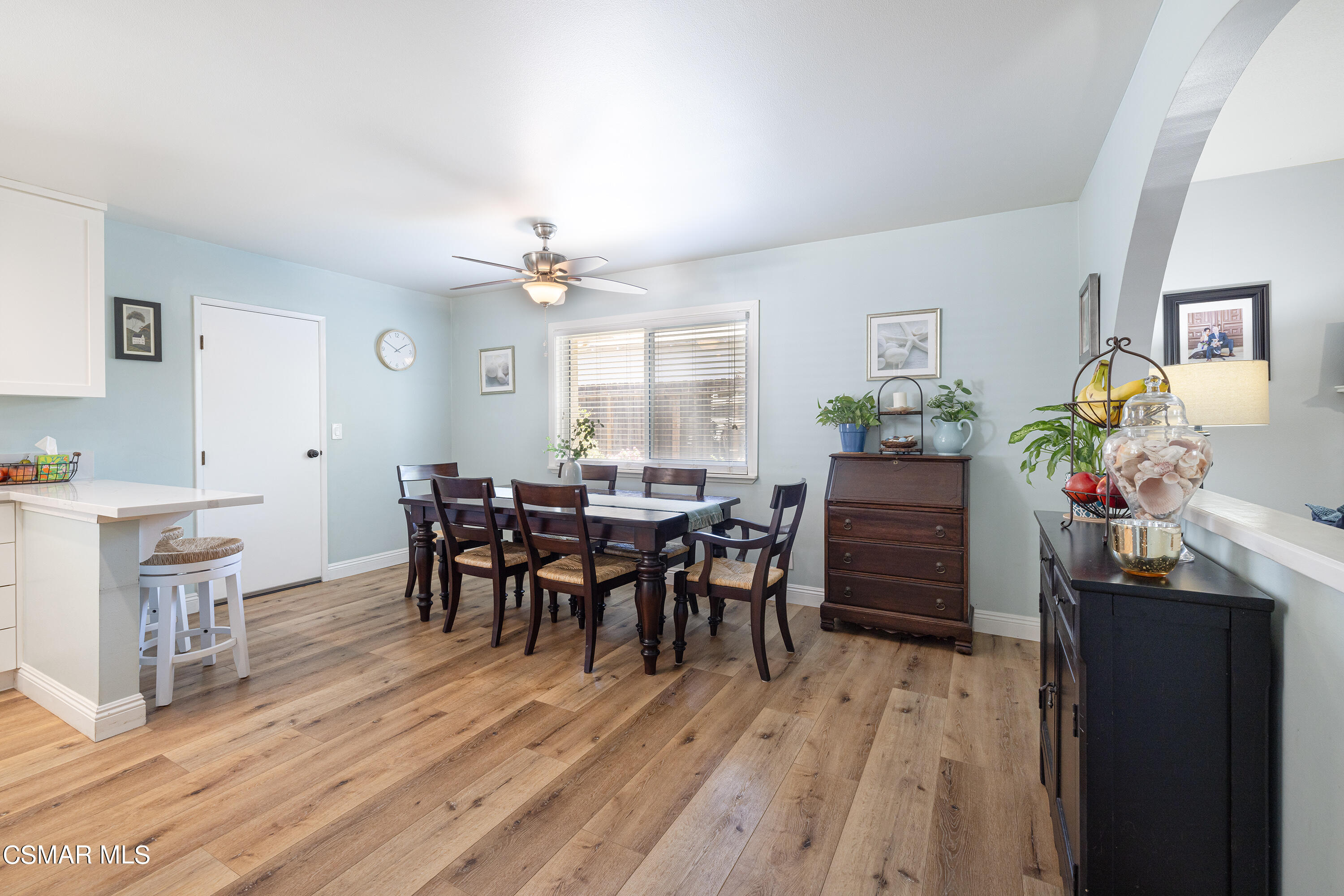 973 Appleton Road Simi Valley, CA 93065 - Photo 7 of 24 a dining room with furniture and wooden floor