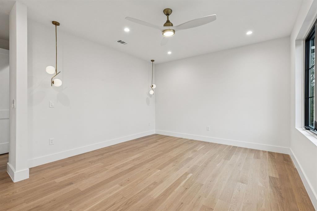 7707 Robin Road Dallas, TX 75209 - Photo 23 of 40 a view of an empty room with a window