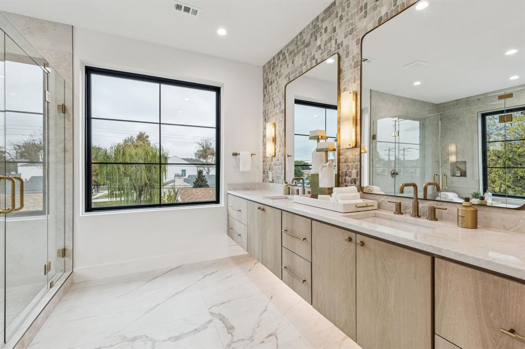 7707 Robin Road Dallas, TX 75209 - Photo 24 of 40 a large white kitchen with a large window