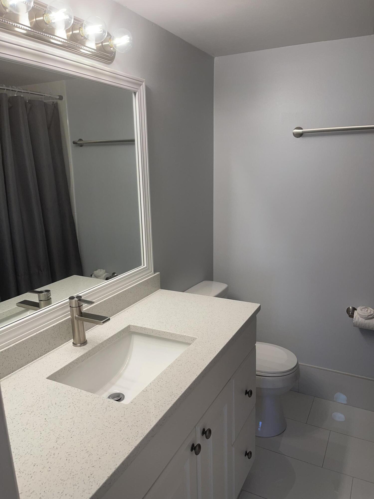 9273 Southwest 8th Street, Unit 116 Boca Raton, FL 33428 - Photo 11 of 15 Bathroom1