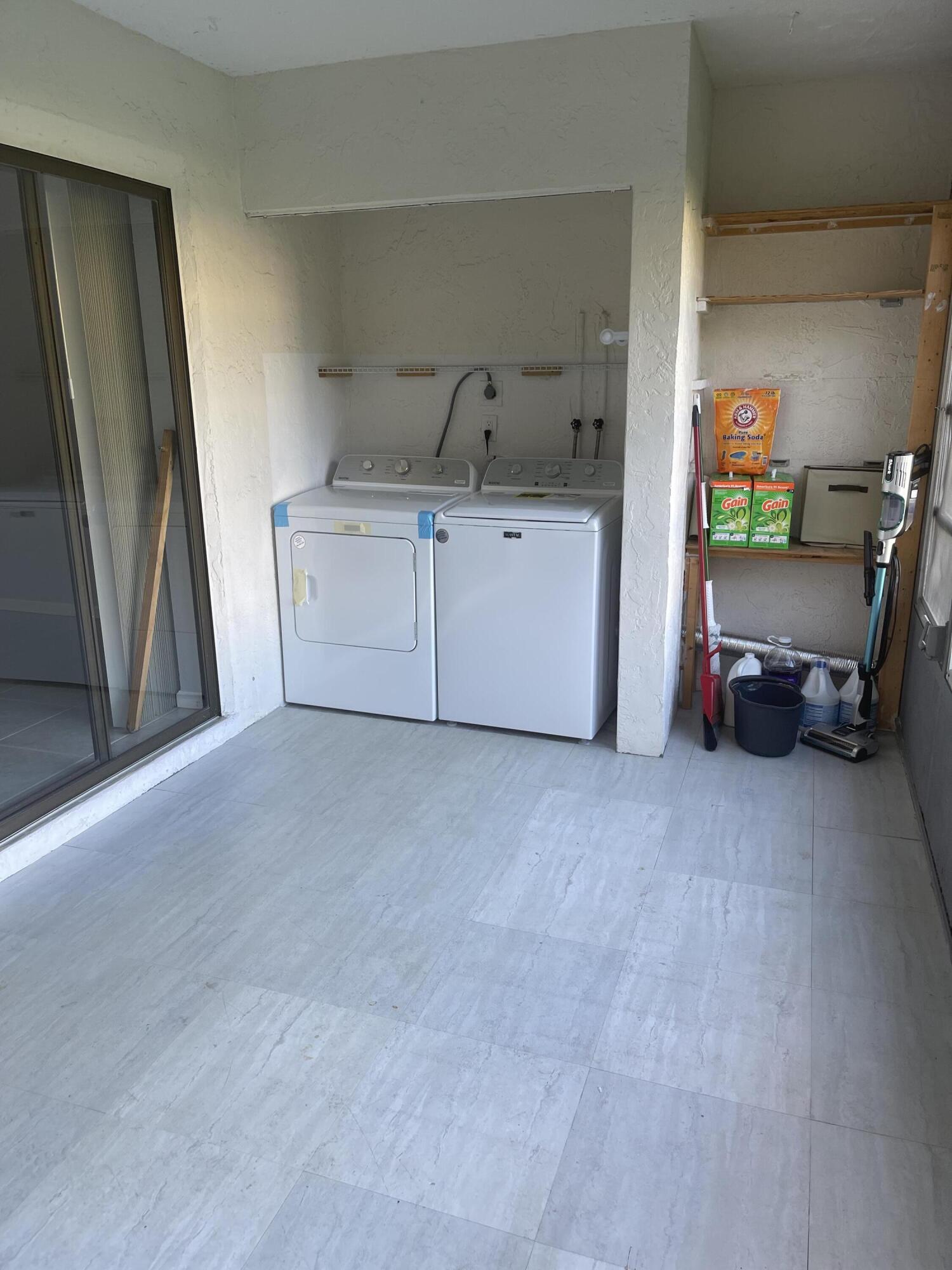9273 Southwest 8th Street, Unit 116 Boca Raton, FL 33428 - Photo 13 of 15 Patio - Laundry
