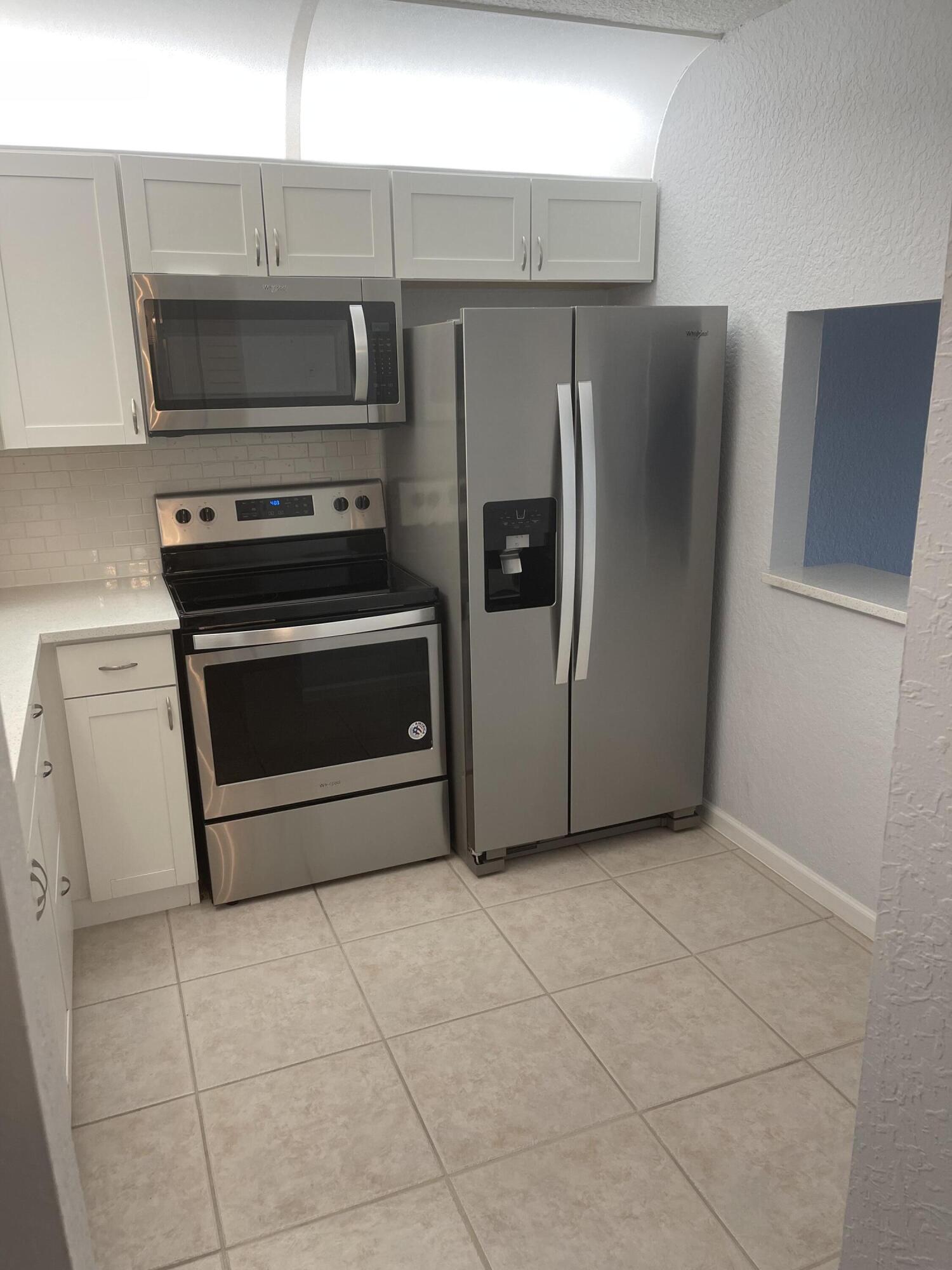 9273 Southwest 8th Street, Unit 116 Boca Raton, FL 33428 - Photo 5 of 15 Kitchen1
